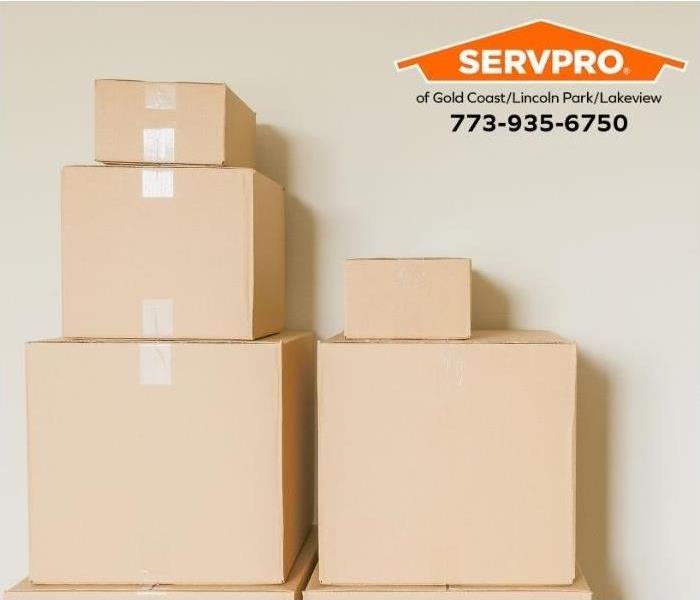 A stack of moving boxes is shown.